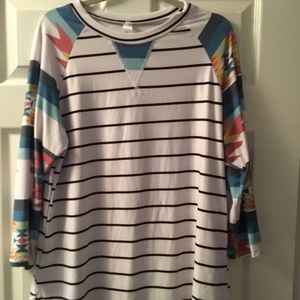 Brand new Tunic top. Silky.  3/4 length sleeves.